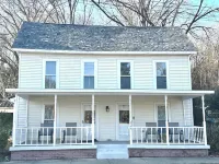 Newly renovated 1890’s home in downtown Milltown beside the Blue River!