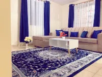 Lux Suites Polytech Court Apartments Hotels near Ruai Shopping Centre