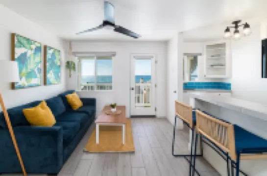 Stunning Ocean Views and Cozy Balcony - Charming Coastal Haven