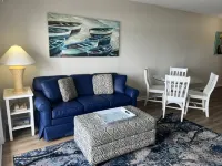 Private Balcony and Modern Kitchenette - Stylish Coastal Escape Hotels in Wrightsville Beach