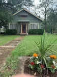 Cozy 2 BR Cottage with Inviting Sunroom, Spacious Yard and Ultimate Comfort Hotels near Kyle Crossing