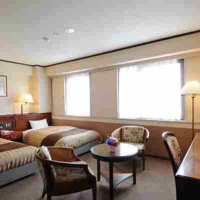 水口センチュリーホテル Rooms