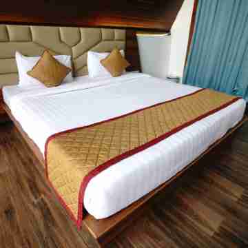 Q Mango Resort Rooms