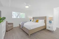 Waterfront Oasis 2BR/2BA with Pool, Gym, Balcony & Parking