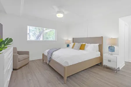 Waterfront Oasis 2BR/2BA with Pool, Gym, Balcony & Parking