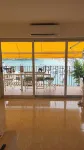Apartment in front of the sea