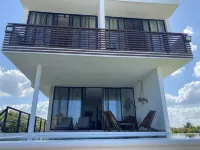 Escape to Paradise, Minimalist 4-BR Beachfront: 300 Mbps with amazing views Hotels in Dzemul