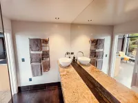 Coastal Calm | Luxe Stay with Views, Bath & Fire.