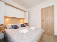Modern apartment for 2-4 persons with garden view and pool use
