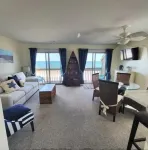 Beach, ocean front condo 6 guests , 2 br, queen sofa bed,  p.u. crib.