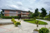 Trishvam Symphony Hotels near KRP Dam Park