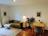 Spacious apartment with direct garden access, close to nature.