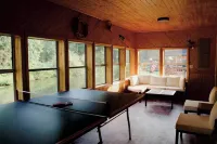 Modern Creekside Lakehouse Hotels in North Harmony