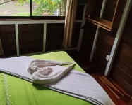 Cabin in La Fortuna with rustic finishes, river and forest