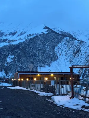 A studio apartment at a secluded area by the river, surrounded by mountains. Hotels near Gergeti Trinity Church