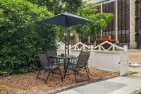 Downtown Den | Steps Away from Worlds Largest Dino