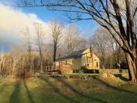 Charming 2-bedroom cottage on private 4 acres with modern amenities