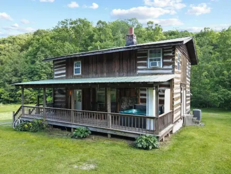 Private, unique log cabin with hot tub, 3 BR/2 bath