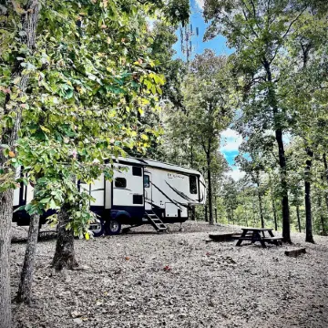 Cozy and serene RV in Broken Bow.  Pet friendly, WiFi, 2 bedroom, fireplace.