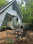 The Blue Cottage located in the woods on Lookout Mountain in Rising Fawn GA