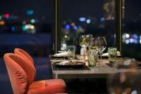 โรงแรมไรซิ่งดรากอนเลเจนด์ - พร้อมอาหารเช้า