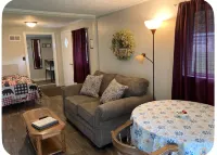 Clean cottage on the Eagle River Chain, dock, firewood, edge of town - Wi-Fi