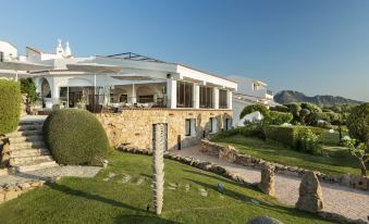 Sulia House Porto Rotondo, Curio Collection by Hilton
