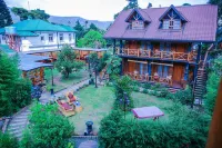 Queenswood Cottage Hotels near ග්‍රෙගරි වැව