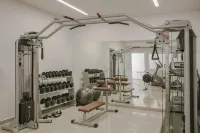 Astra Village Hotel Suites - Gym