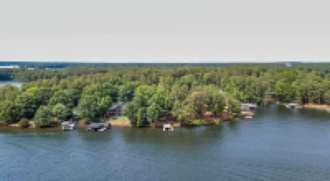 Newly renovated beauty on main lake with sunrise to sunset panoramic views!