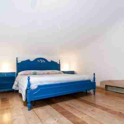 Secluded old farmhouse with a view and pool to relax in total quiet. Rooms