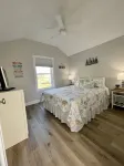 Cozy riverfront cottage with an easy beach-inspired coastal MI vibe!