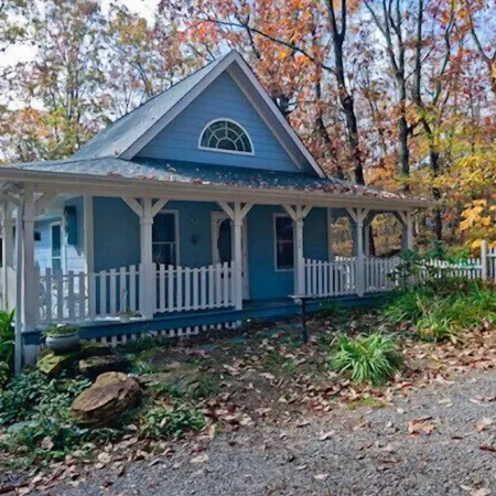 The Blue Cottage located in the woods on Lookout Mountain in Rising Fawn GA