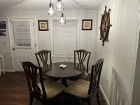 This Two-Bedroom Cottage Features One Queen Bed, Two Twin Beds, and a Sofa Bed.