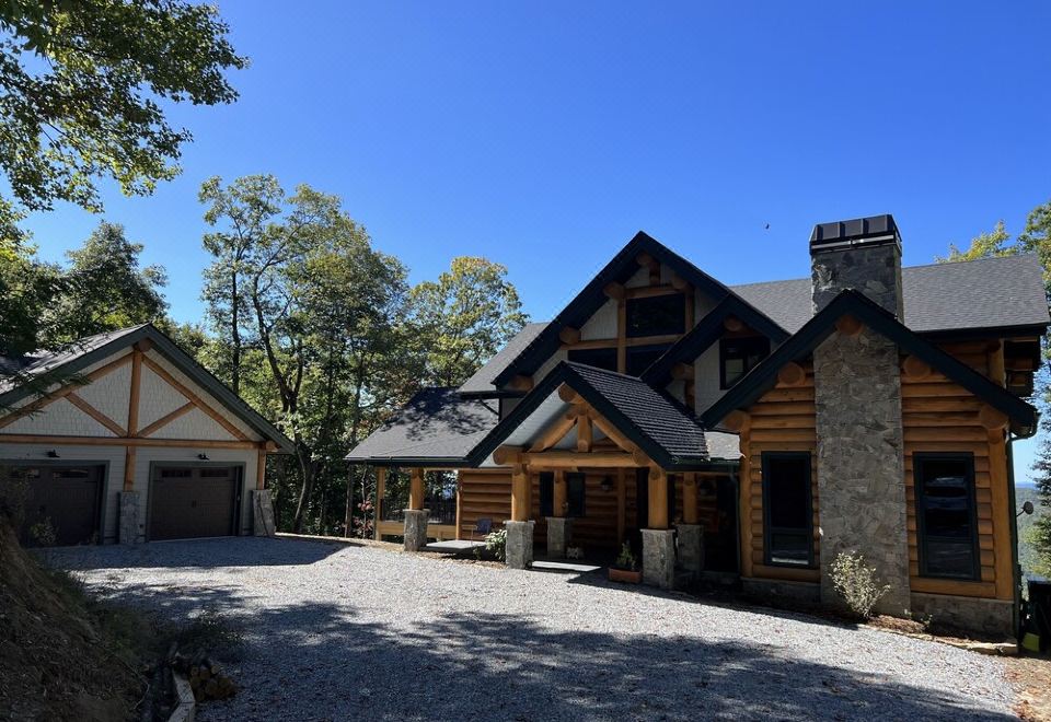 Spectacular mountain lodge with long mountain and lake views. Sunset ...