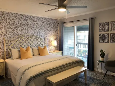 Walk to beach. Perfect for families & couples. Pool & tennis onsite.