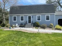 Lovely home near beaches. Ample yard with patio with enclosed porch & hot tub.