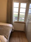 Comfort vacation apartment with south-facing balcony and unique view of the mudflats - balcony
