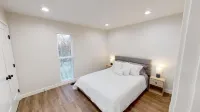 Modern and Cozy 4-bedroom home - chambre d’hôtes