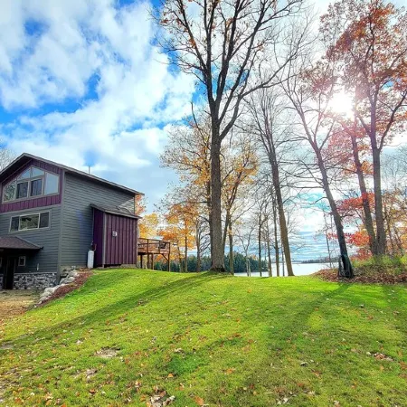Private Newly Built Woman Lake Cabin with Detached Barn Style Bunk House