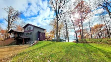 Private Newly Built Woman Lake Cabin with Detached Barn Style Bunk House