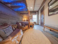Steps to Elk River! Cozy Cabin w/ Hot Tub & Bunk Room Hotels in Avery County