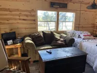 Brand new tiny cabin located on farm. Near rivers, trailsheads & national forest