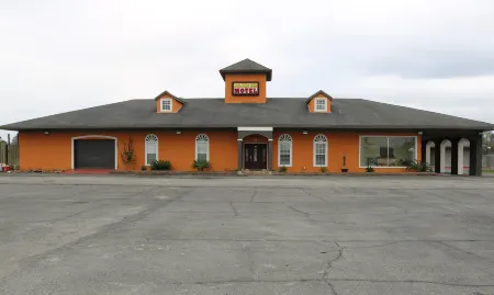 Deluxe Inn Motel Отели в г. Мосс Блафф