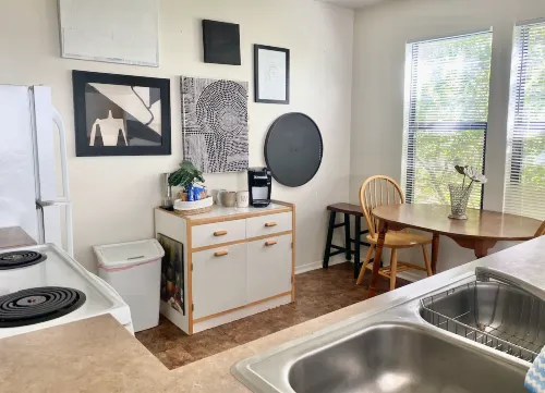 Full Kitchen and Relaxing Living Area with Pool - Cozy Inviting