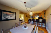 Ski slope-view condo on Gore Creek with fireplace - walk to Vail Village