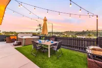 Breezy dog-friendly house with hot tub, central AC, game room, & washer/dryer