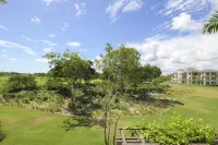 Fully Equipped Apartment Overlooking Golf Course at Luxury Beach Resort Hotels in 