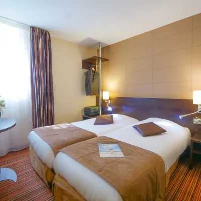 هوتل إن ديزاين آند ريستورانت أمينز Hotels near زينيت داميان