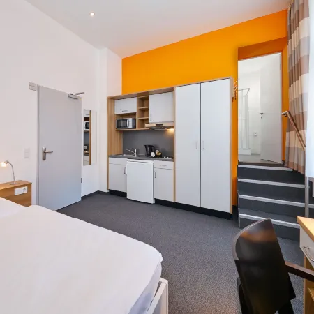 Townhouse Düsseldorf Отели рядом с достопримечательностью «Рейнская телебашня (Рейнтурм)»